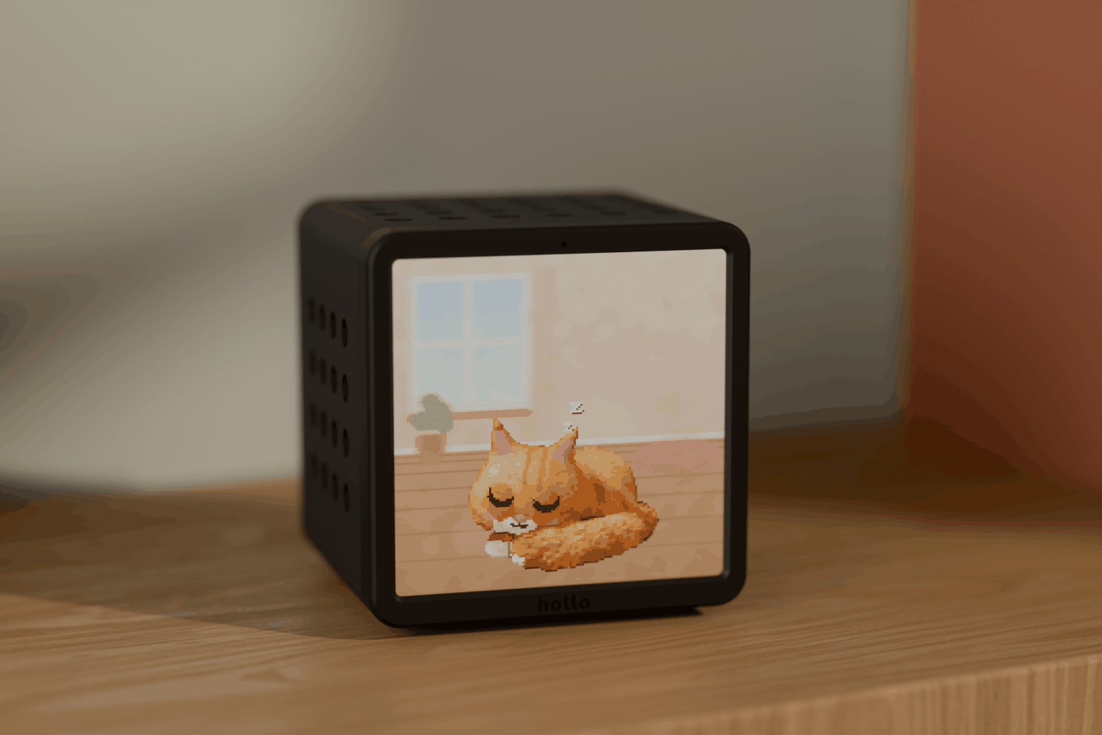 Rendered scene: a black Hollo on a wooden shelf with books and a plant, showing a pixel cat asleep on its screen